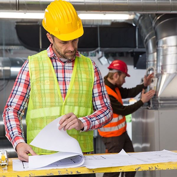 Man checking on installation